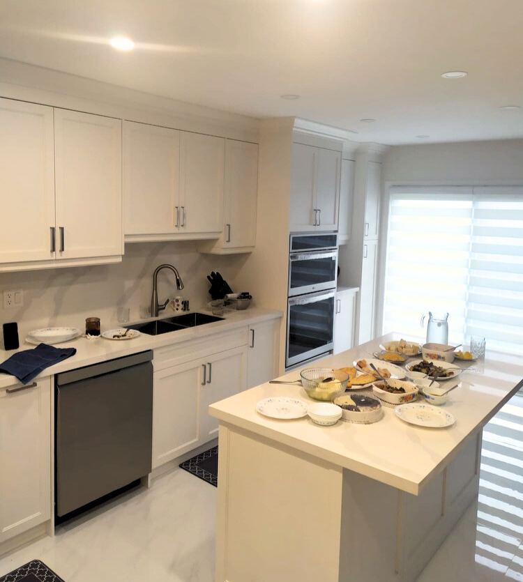 Mississauga kitchen renovation planning with white cabinetry and quartz surfaces