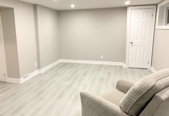 Scarborough basement renovation with engineered wood flooring and moisture-resistant finishes