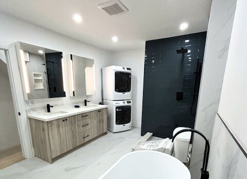 Toronto bathroom renovation with walk-in shower, built-in tub, and LED mirror cabinet