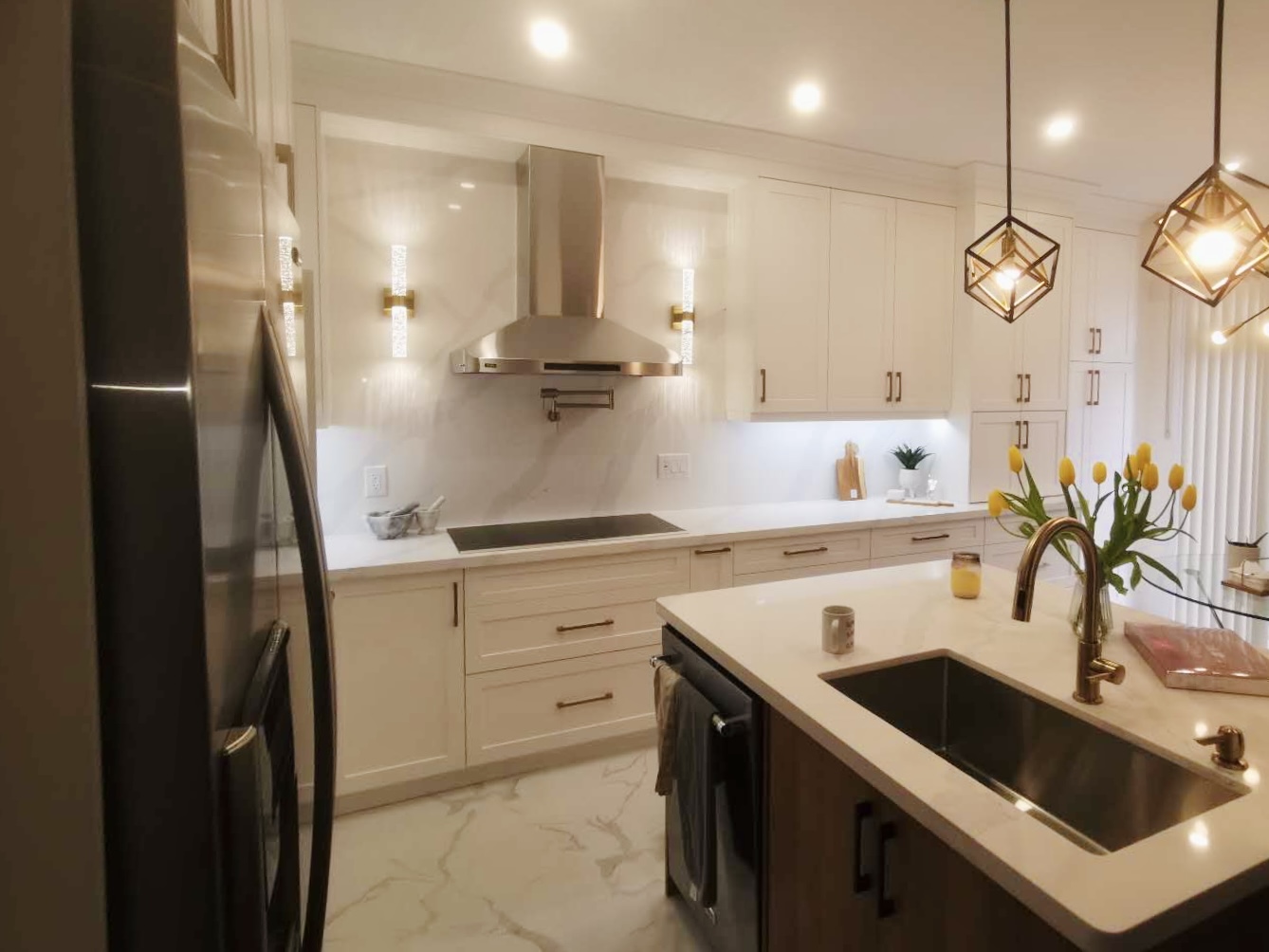 Mississauga kitchen renovation with warm LED lighting and quartz island