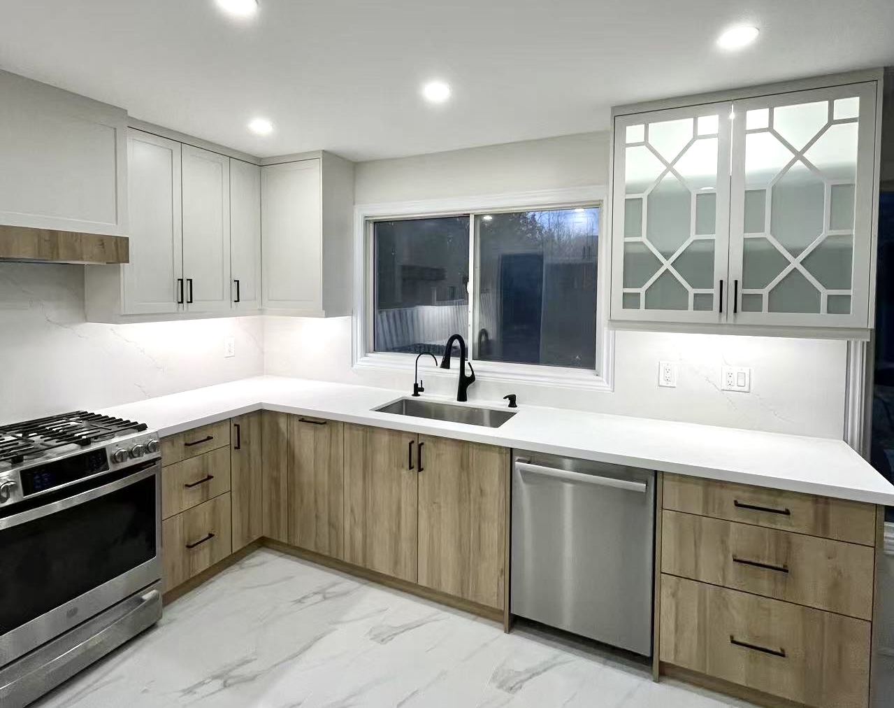 After — LED lighting in white kitchen
