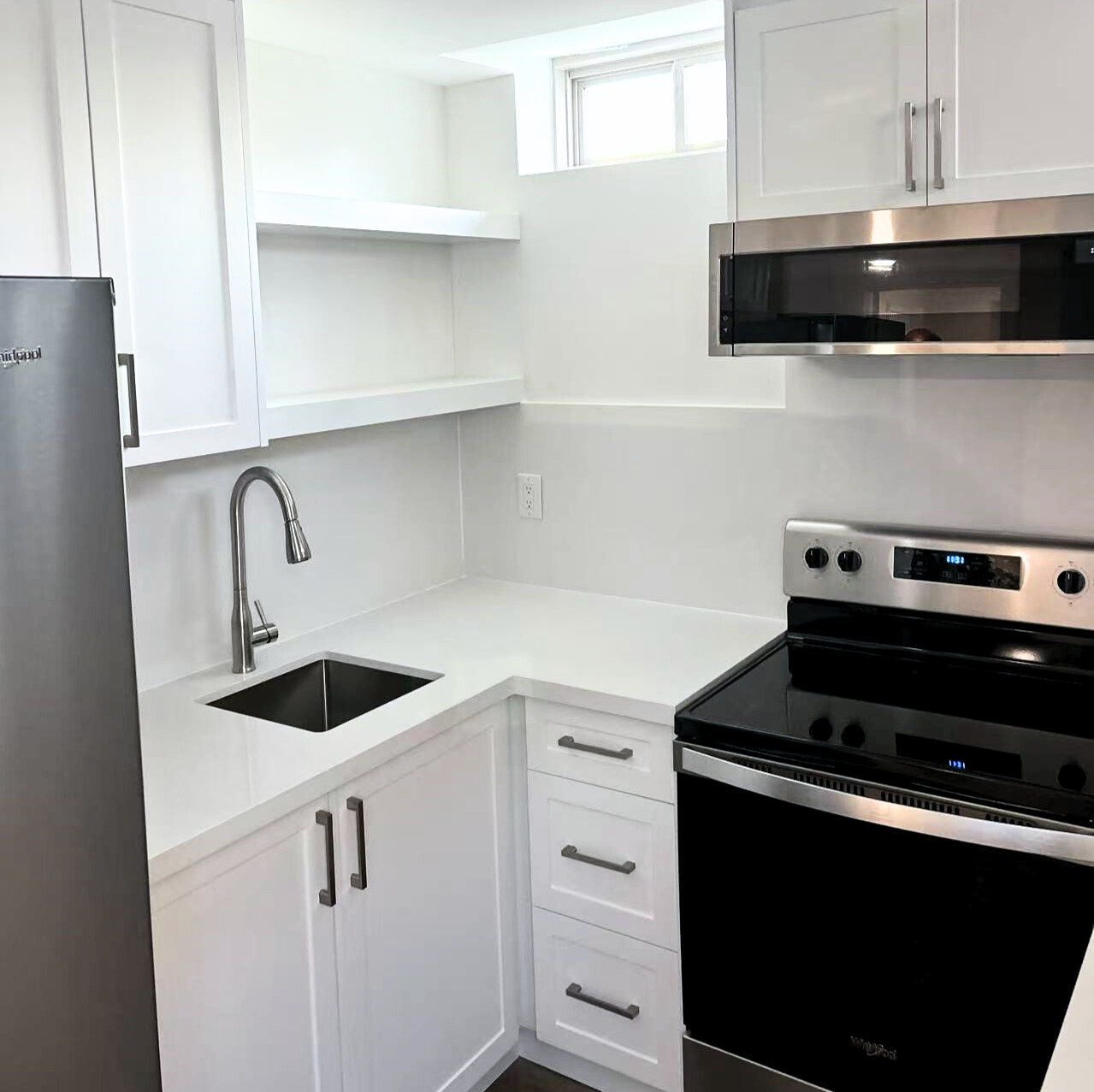 Oshawa kitchen renovation — dark tile flooring