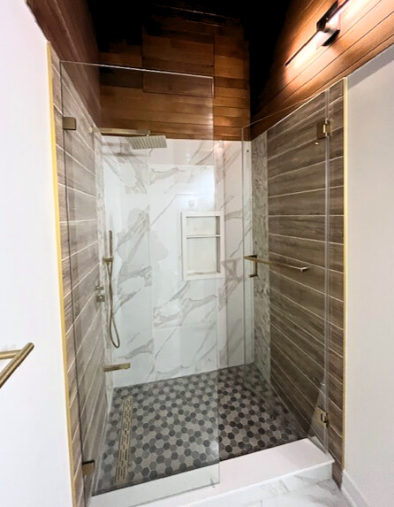 Mississauga bathroom renovation with gold faucet fixtures and quartz vanity