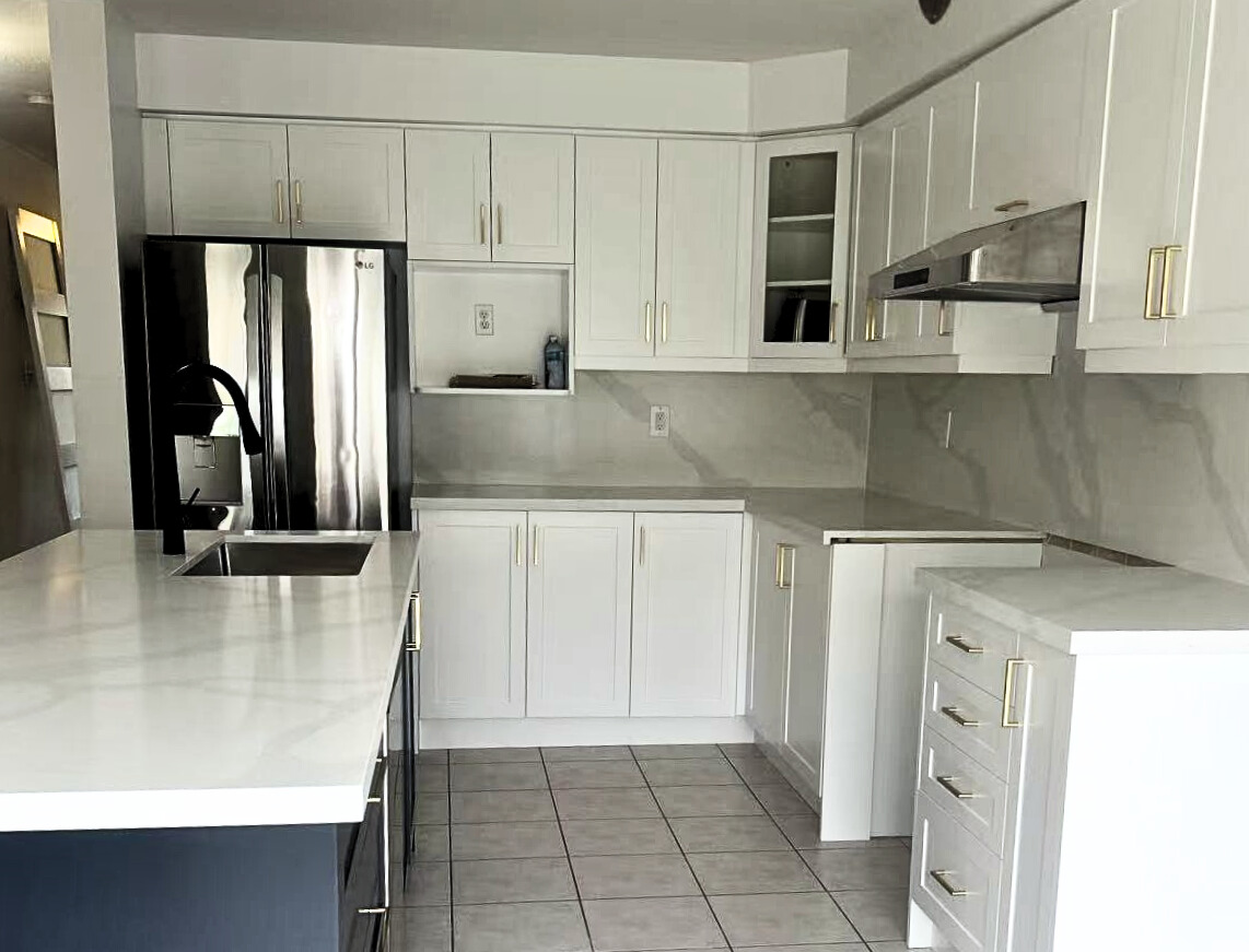 Haverhill modern kitchen renovation with white design and dark cabinetry