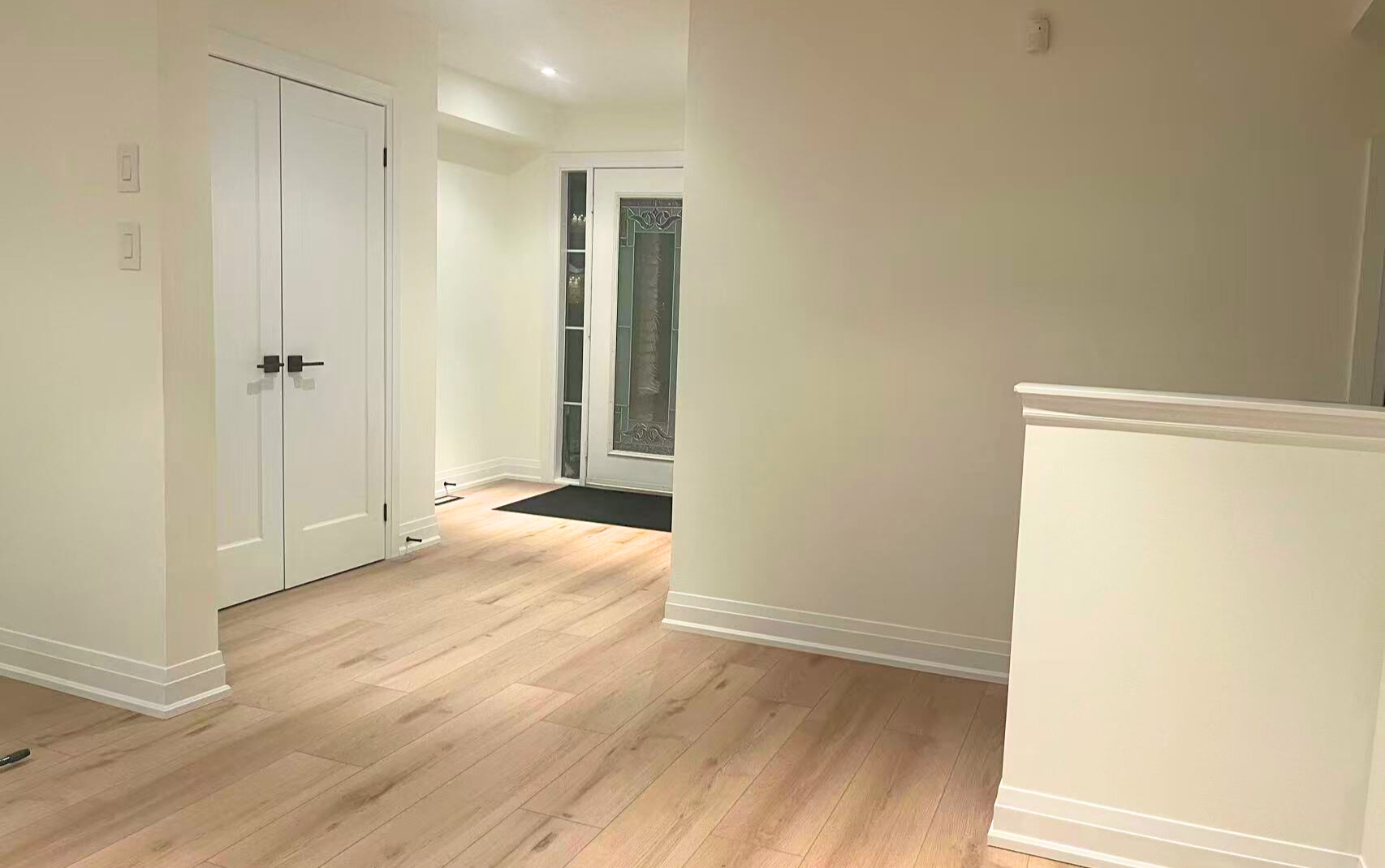 Natural light wood staircase renovation Ontario