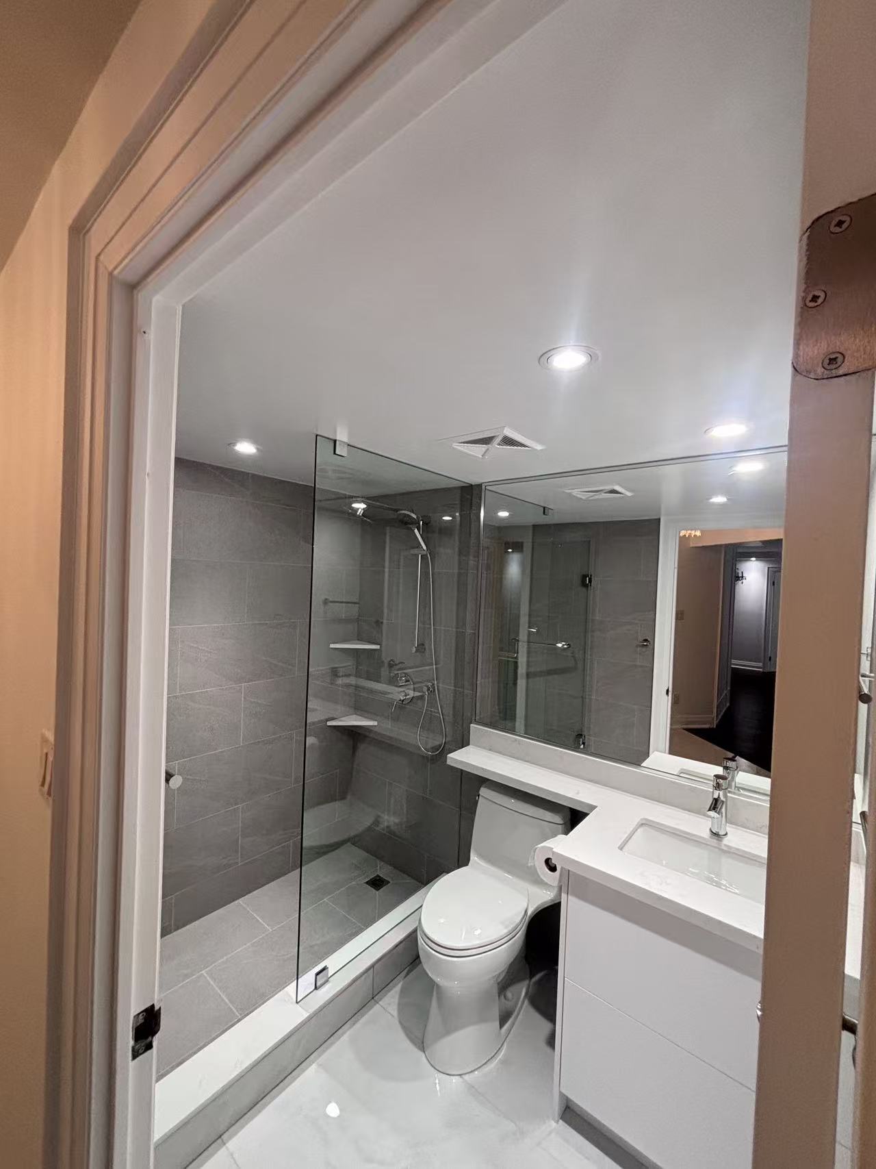 Condo renovation — white kitchen cabinetry